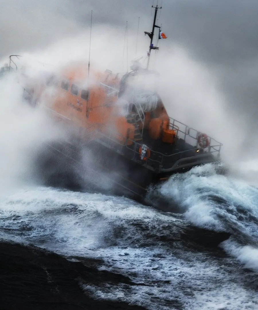 A lifeboat driving through storm swell